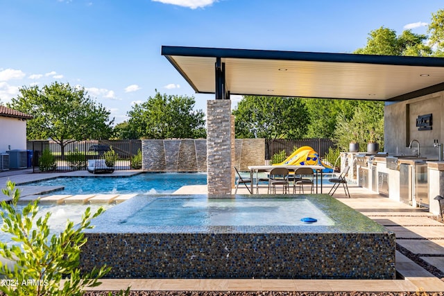 view of pool featuring central AC unit, a fenced in pool, area for grilling, fence, and a patio area