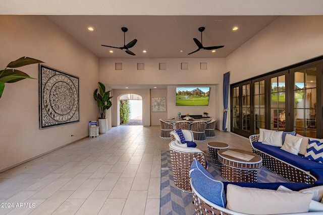 view of patio / terrace with outdoor dining area, ceiling fan, and an outdoor hangout area