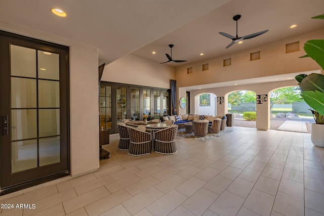 view of patio / terrace featuring a ceiling fan and an outdoor living space