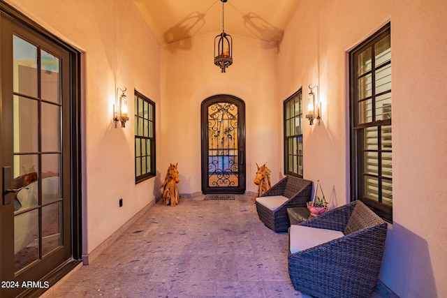 entrance to property with stucco siding