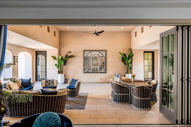 view of patio / terrace with ceiling fan and outdoor lounge area