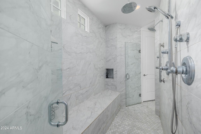 bathroom featuring a shower stall