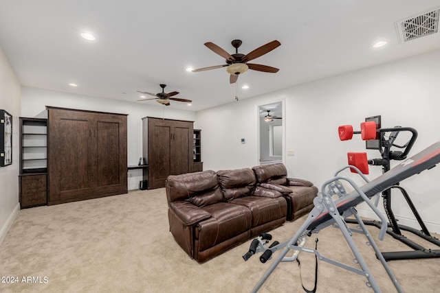 living room with recessed lighting, visible vents, baseboards, and light colored carpet