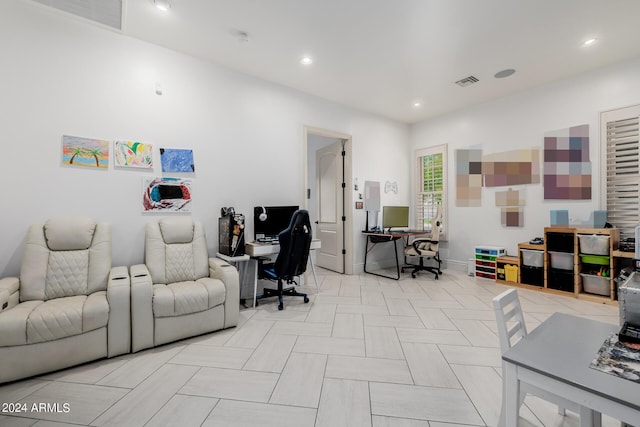 home office with recessed lighting, visible vents, and baseboards