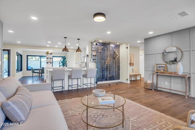 4910 E Shaw Butte Dr, Scottsdale, AZ 85254 - living area featuring wood finished floors, recessed lighting, and baseboards