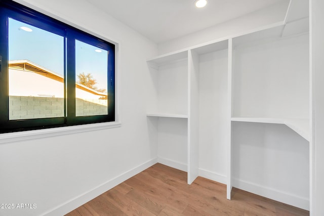 4910 E Shaw Butte Dr, Scottsdale, AZ 85254 - spacious closet with wood finished floors