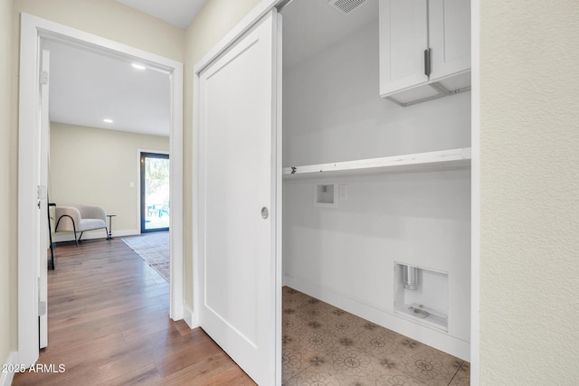4910 E Shaw Butte Dr, Scottsdale, AZ 85254 - washroom with washer hookup, cabinet space, recessed lighting, baseboards, and wood finished floors
