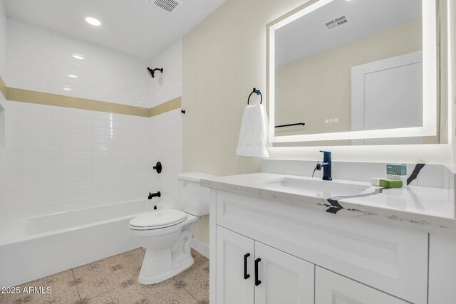 4910 E Shaw Butte Dr, Scottsdale, AZ 85254 - bathroom with vanity, shower / washtub combination, toilet, tile patterned floors, and baseboards