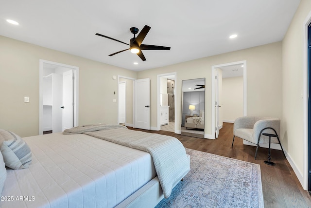 4910 E Shaw Butte Dr, Scottsdale, AZ 85254 - bedroom with wood finished floors, a spacious closet, recessed lighting, baseboards, and ensuite bath