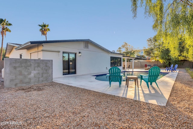 4910 E Shaw Butte Dr, Scottsdale, AZ 85254 - rear view of property with stucco siding, a fenced backyard, and a patio area