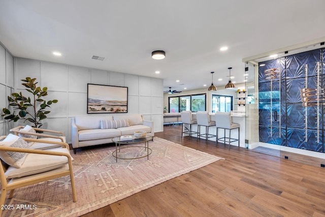4910 E Shaw Butte Dr, Scottsdale, AZ 85254 - living room with wood finished floors and recessed lighting