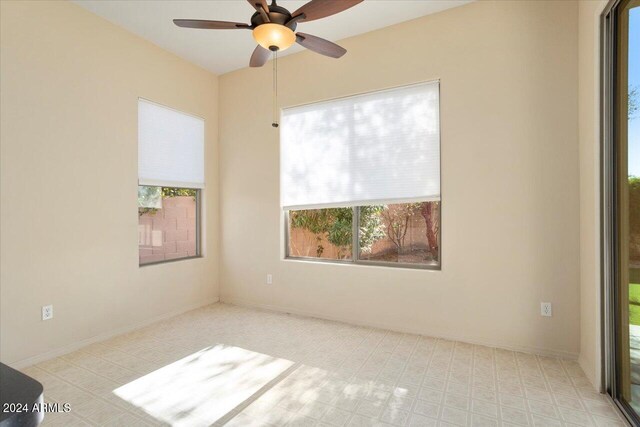 empty room featuring ceiling fan