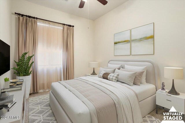 carpeted bedroom featuring ceiling fan