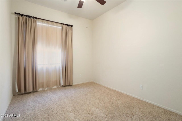 unfurnished room with carpet and ceiling fan