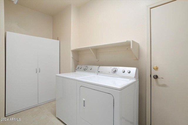 laundry area featuring separate washer and dryer