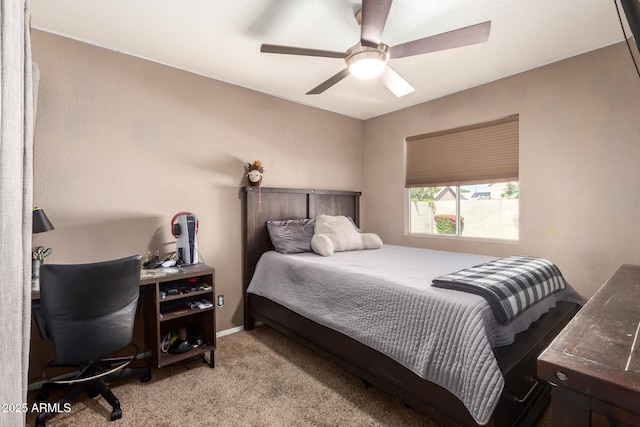carpeted bedroom with a ceiling fan