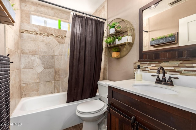 bathroom with vanity, toilet, shower / bath combo with shower curtain, tasteful backsplash, and visible vents