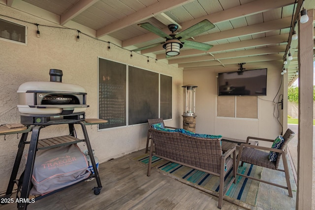 view of patio with ceiling fan