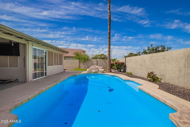 view of pool with a fenced in pool and a fenced backyard