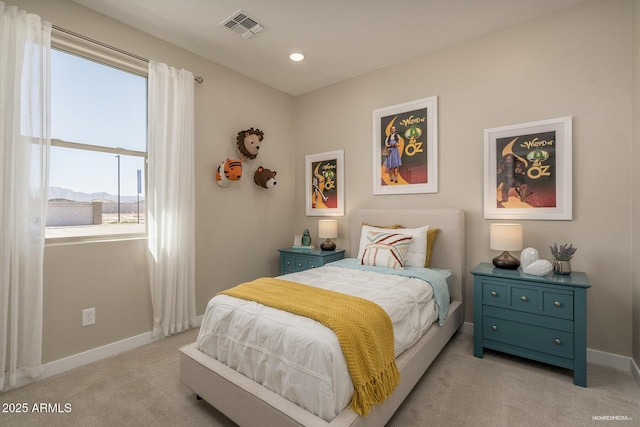 carpeted bedroom featuring a mountain view