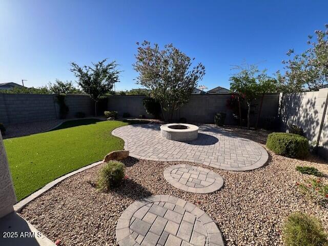 17066 W Seldon Ln, Waddell, AZ 85355 - view of yard featuring a patio area and a fire pit