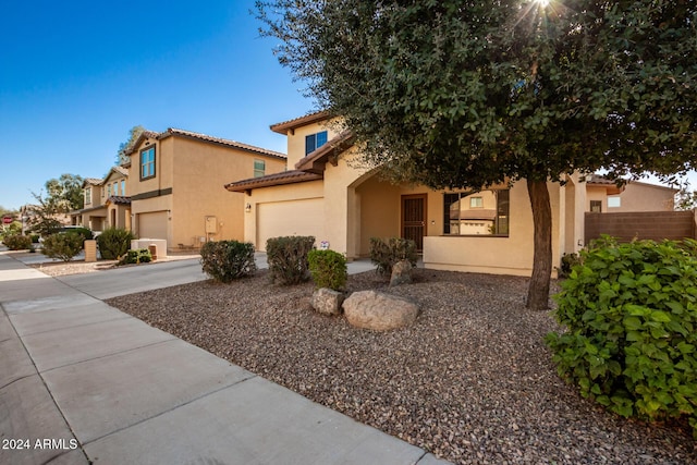 view of front of property with a garage