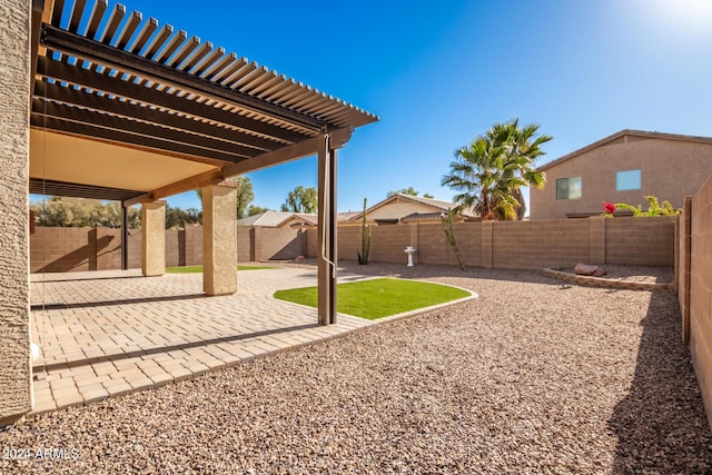 view of yard featuring a pergola and a patio area