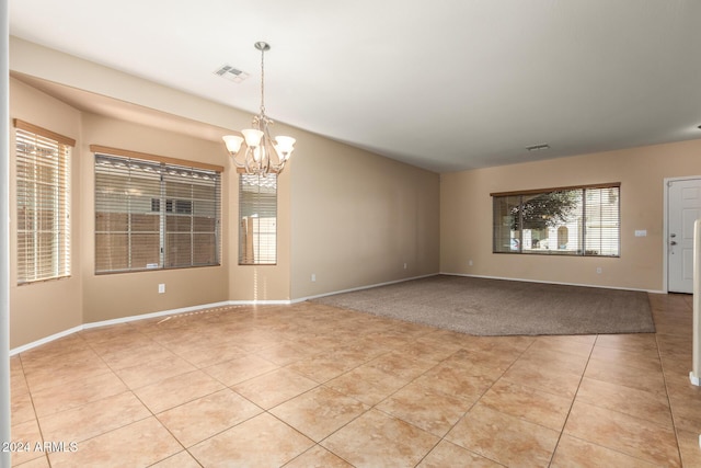 interior space featuring a notable chandelier