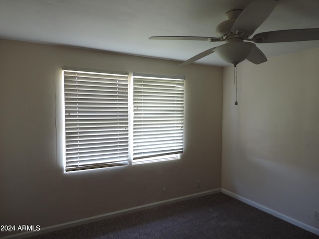 unfurnished room featuring carpet floors and ceiling fan