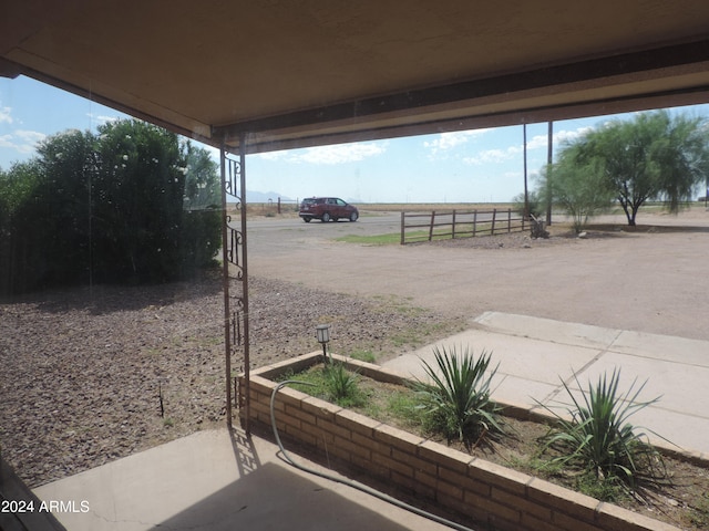 view of patio / terrace featuring a rural view