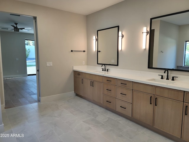 7724 E Charter Oak Rd, Scottsdale, AZ 85260 - full bathroom featuring double vanity and a ceiling fan