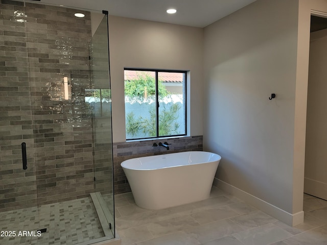 7724 E Charter Oak Rd, Scottsdale, AZ 85260 - full bathroom with a freestanding bath, a shower stall, and recessed lighting