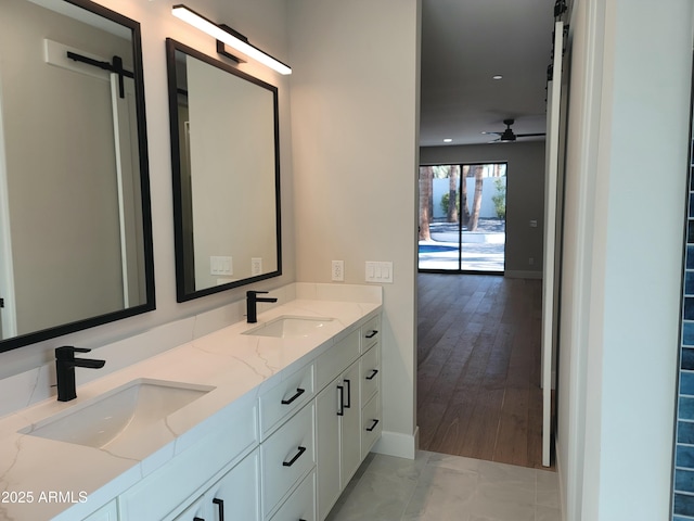 7724 E Charter Oak Rd, Scottsdale, AZ 85260 - full bathroom featuring double vanity and a ceiling fan