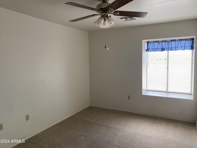 carpeted empty room with ceiling fan