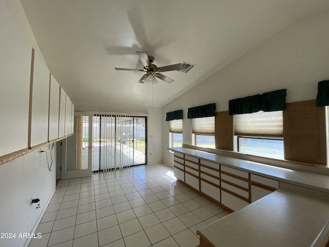 interior space with ceiling fan and lofted ceiling