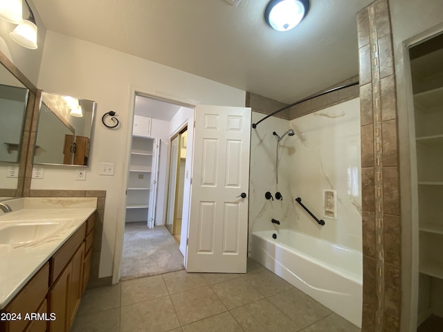 bathroom with vanity and  shower combination