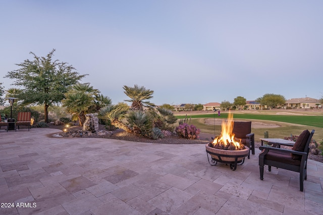 view of patio / terrace with a fire pit