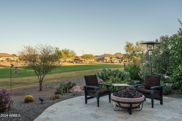 view of patio / terrace featuring a fire pit