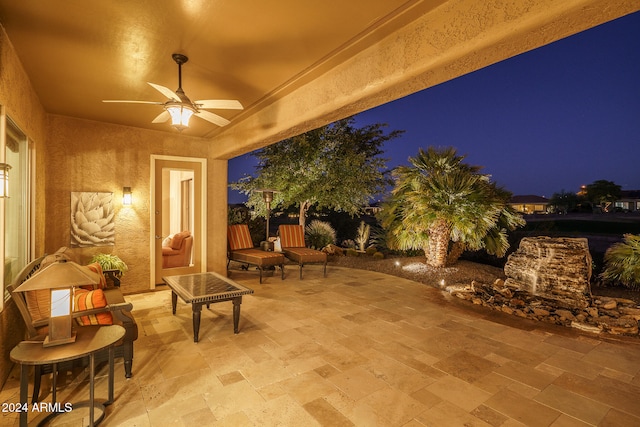 patio at twilight with ceiling fan