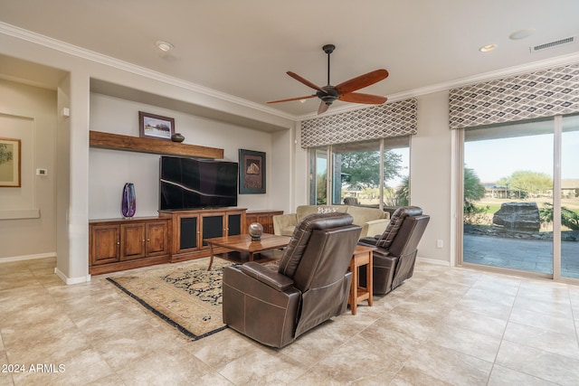 living room with ceiling fan, crown molding, and light tile patterned flooring