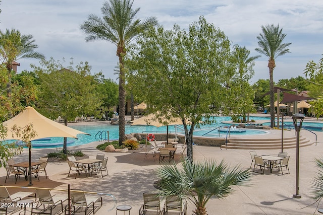 view of pool featuring a patio