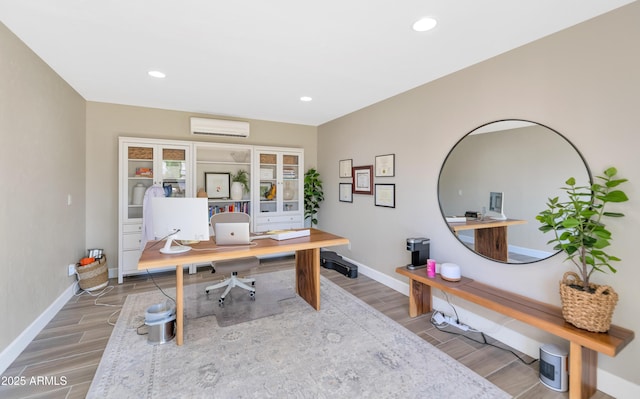 5971 E Orange Blossom Ln, Phoenix, AZ 85018 - office featuring wood finished floors, recessed lighting, and a wall unit AC