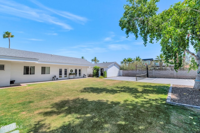 5971 E Orange Blossom Ln, Phoenix, AZ 85018 - view of yard with french doors and basketball court