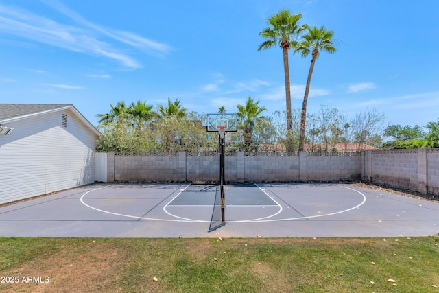 5971 E Orange Blossom Ln, Phoenix, AZ 85018 - view of sport court featuring basketball hoop and a fenced backyard