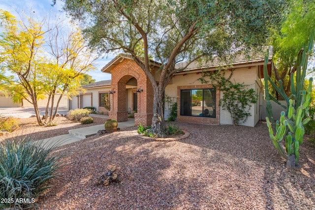 view of front of property featuring a garage