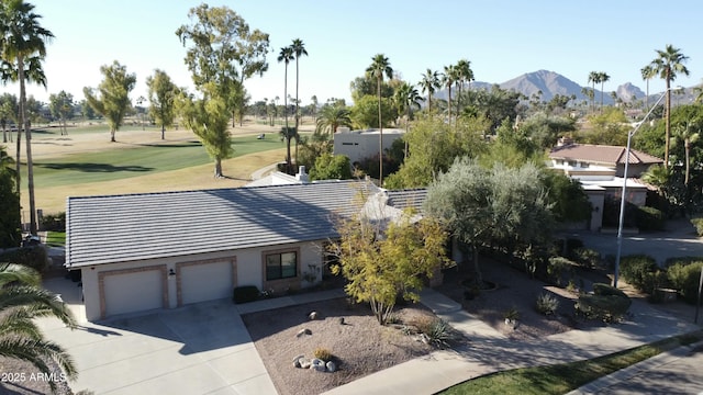 birds eye view of property featuring a mountain view