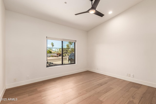 8005 N Via De Lago, Scottsdale, AZ 85258 - unfurnished room featuring light wood-style floors, baseboards, ceiling fan, recessed lighting, and vaulted ceiling