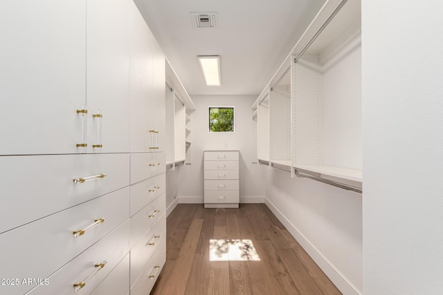 8005 N Via De Lago, Scottsdale, AZ 85258 - walk in closet featuring light wood finished floors
