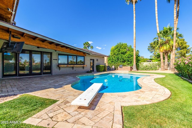 8005 N Via De Lago, Scottsdale, AZ 85258 - view of swimming pool featuring a patio area, a diving board, and french doors