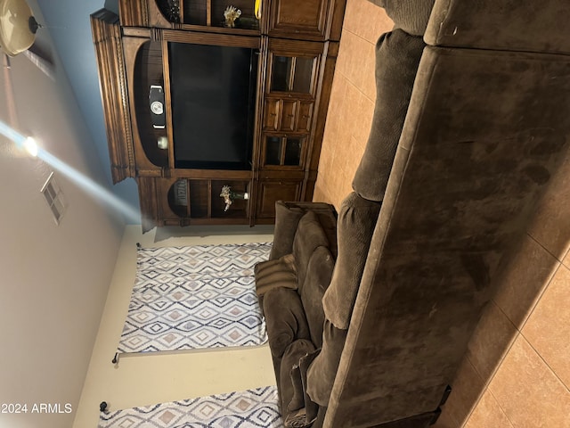 living room featuring light tile patterned floors